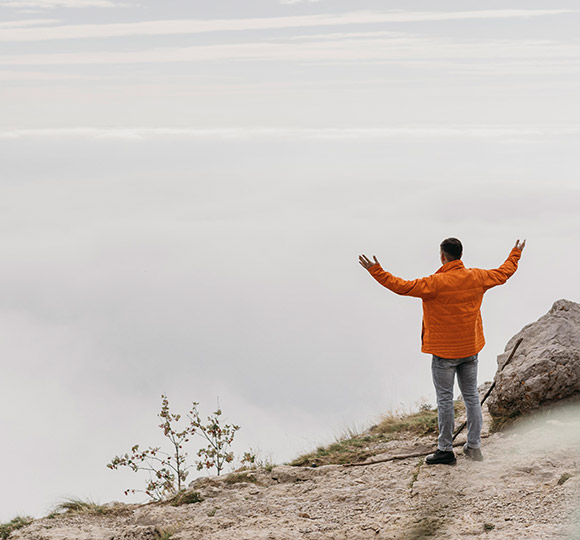 Person standing on cliff